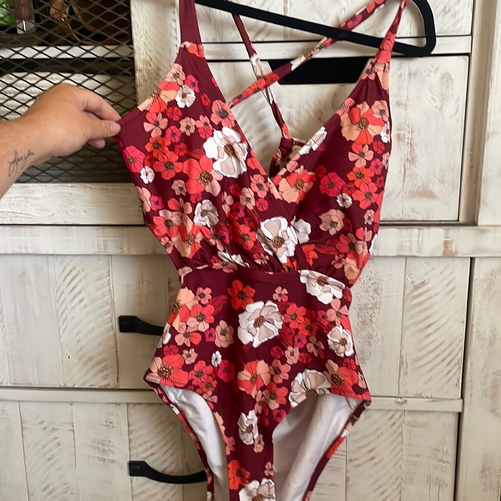 Never worn one piece